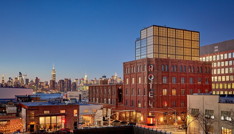 Brick facade of the former cooperage housing the Wythe Hotel in Williamsburg, Brooklyn
