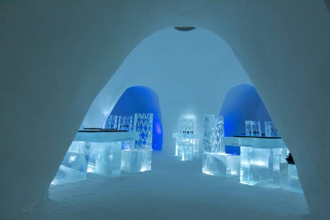 Carved snow walls in a hall of the SnowVillage at Lainio in Finnish Lapland